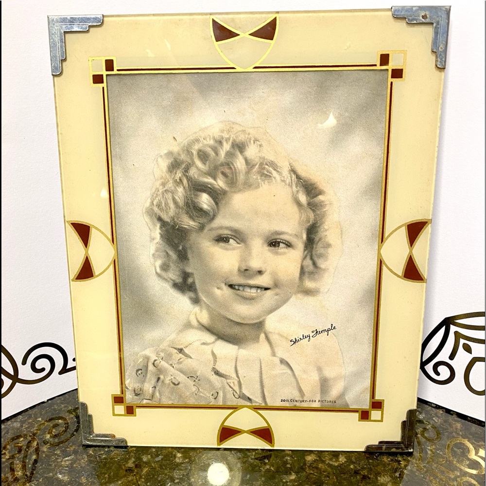 Vintage Art Deco frame with copy of a picture of Shirley Temple.20th century fox